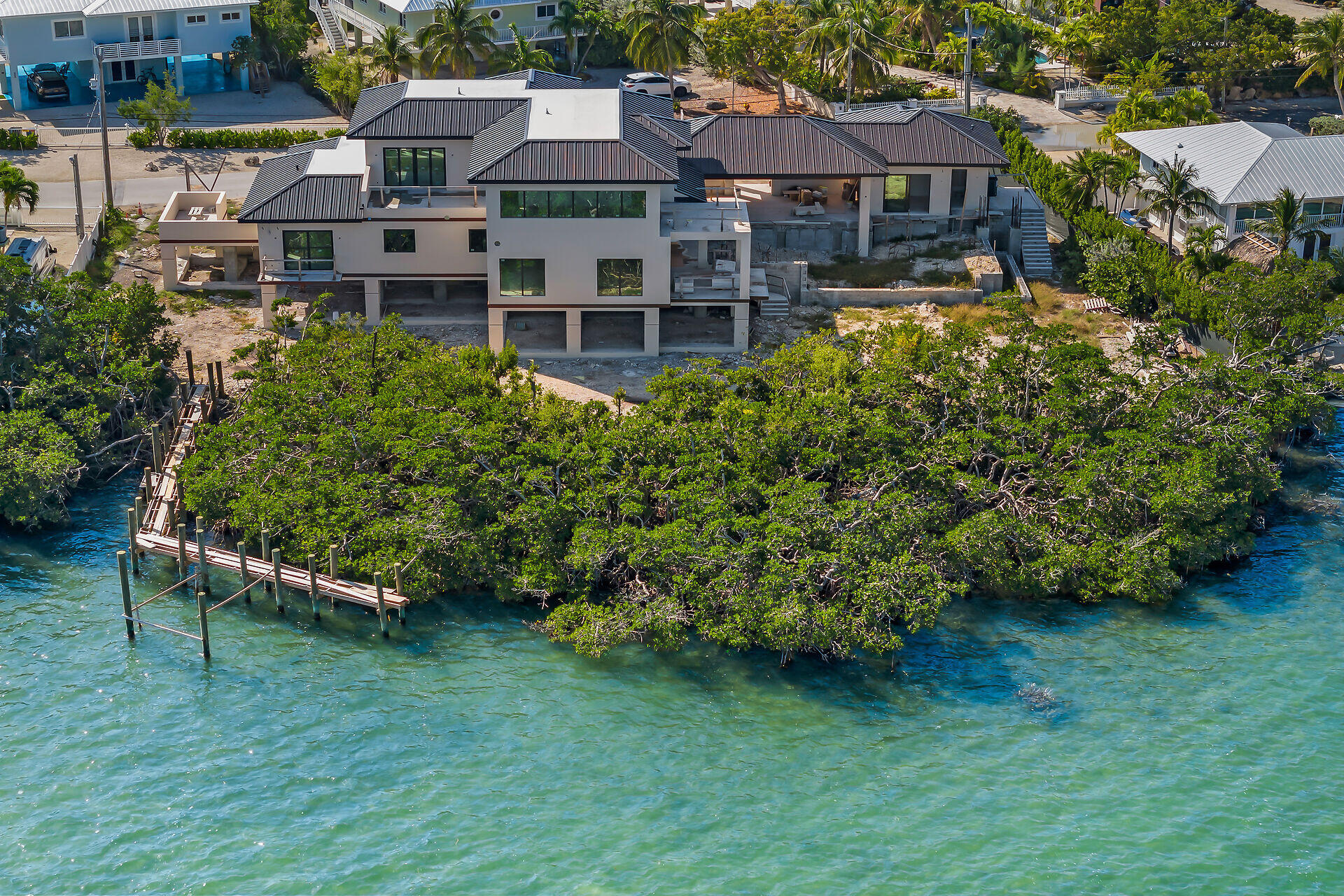 an aerial view of a house with a garden