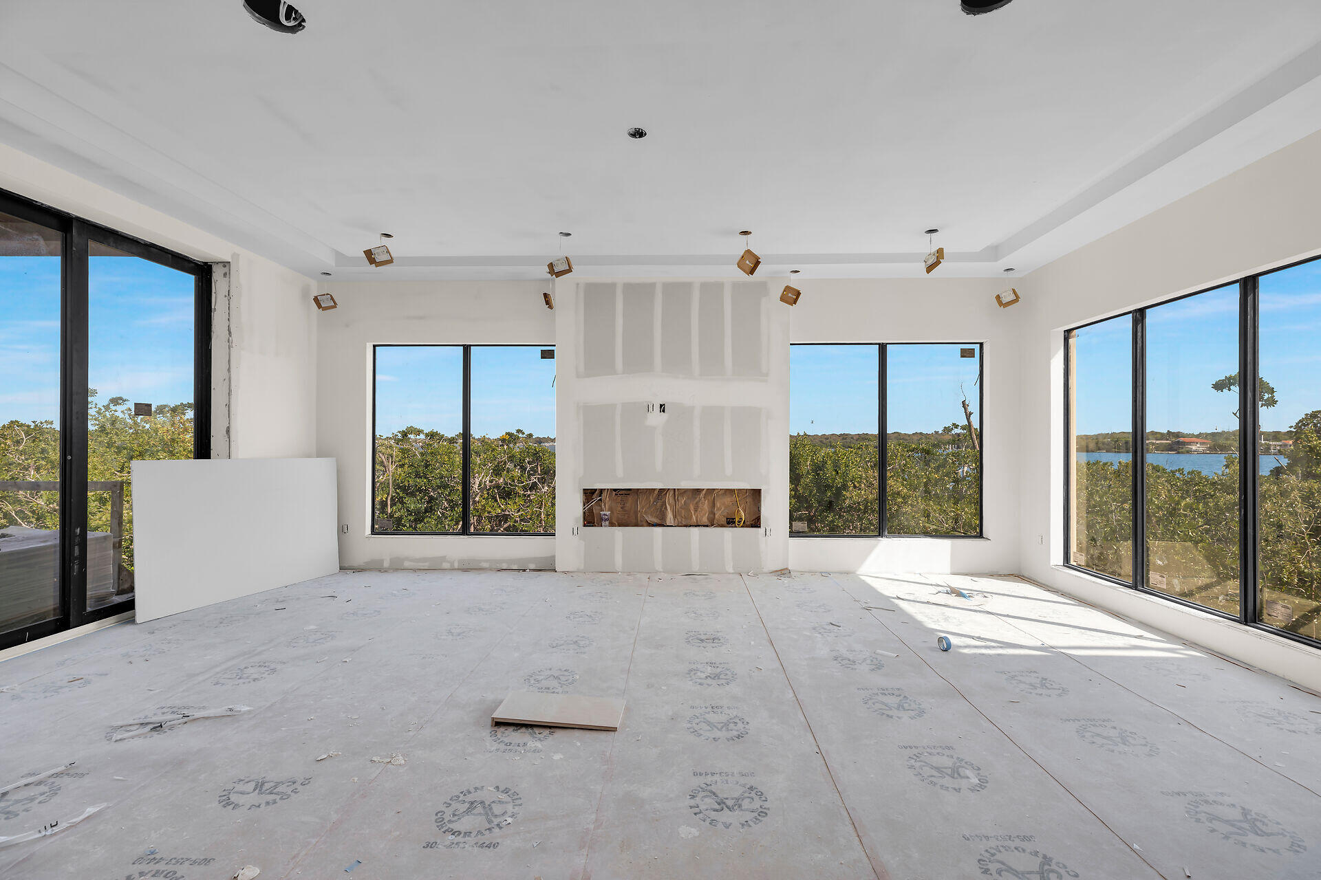 25 Mutiny Place Key Largo, FL 33037 - Photo 12 of 41 a view of a big room with windows and chandelier