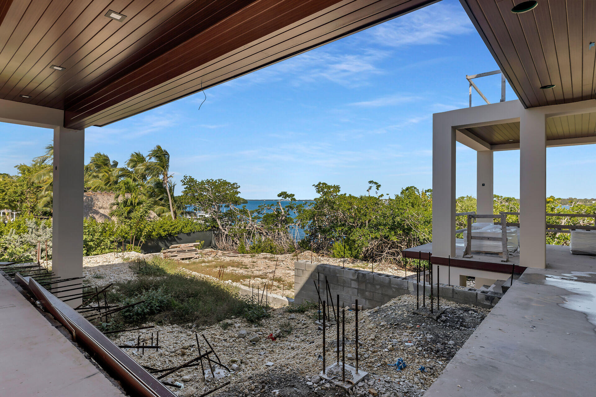 25 Mutiny Place Key Largo, FL 33037 - Photo 10 of 41 a view of a porch with furniture and a yard