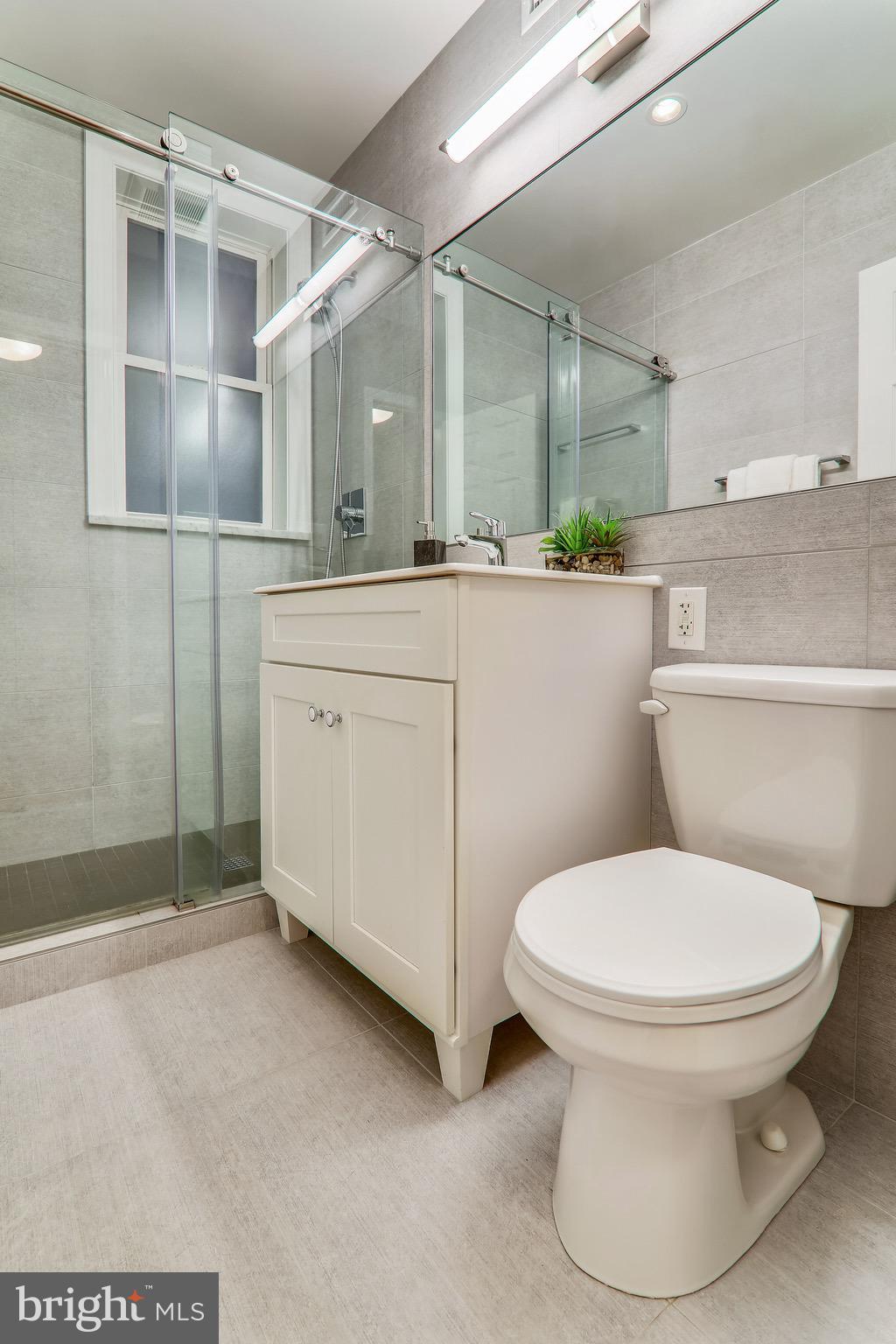 1438 Columbia Road Northwest, Unit 201 Washington, DC 20009 - Photo 22 of 27 Updated bathroom