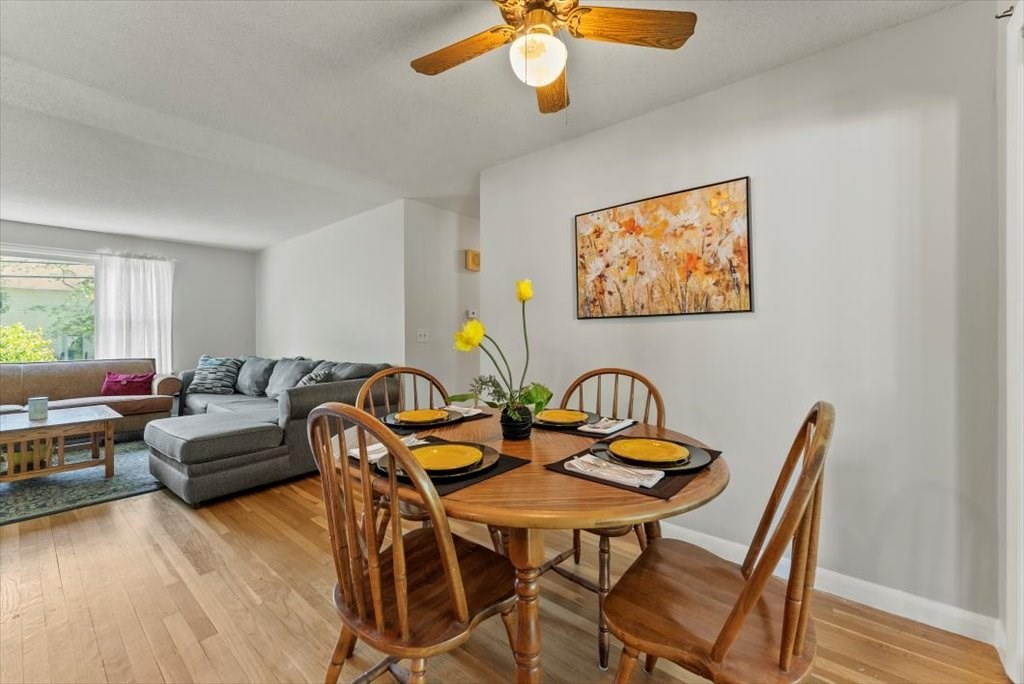 528 Morgan Road West Springfield, MA 01089 - Photo 11 of 42 a view of a dining room with furniture and wooden floor