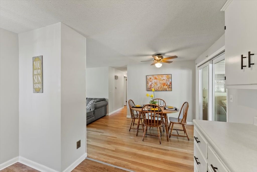 528 Morgan Road West Springfield, MA 01089 - Photo 15 of 42 a view of a dining room with furniture and wooden floor