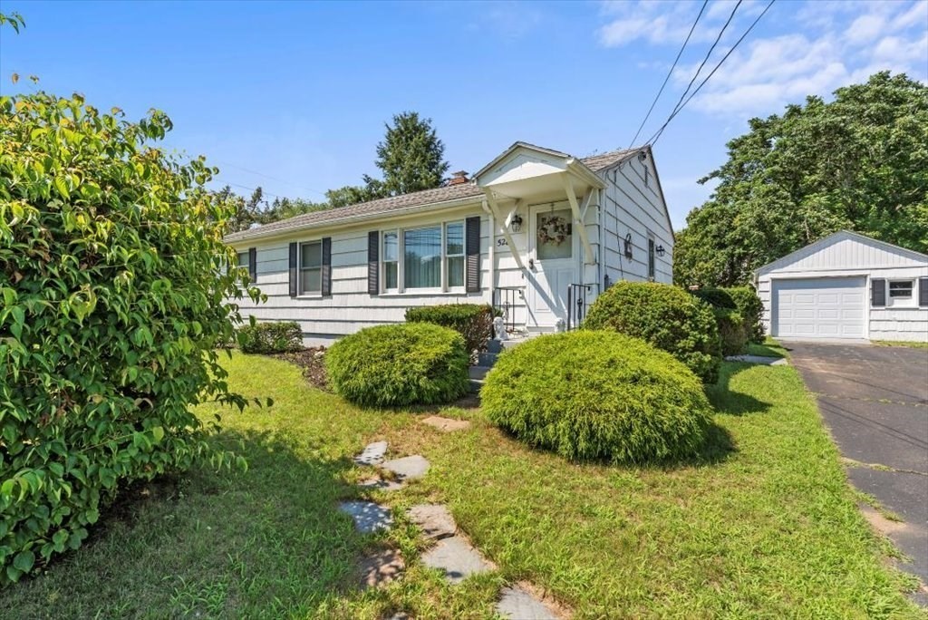 528 Morgan Road West Springfield, MA 01089 - Photo 2 of 42 a front view of a house with garden