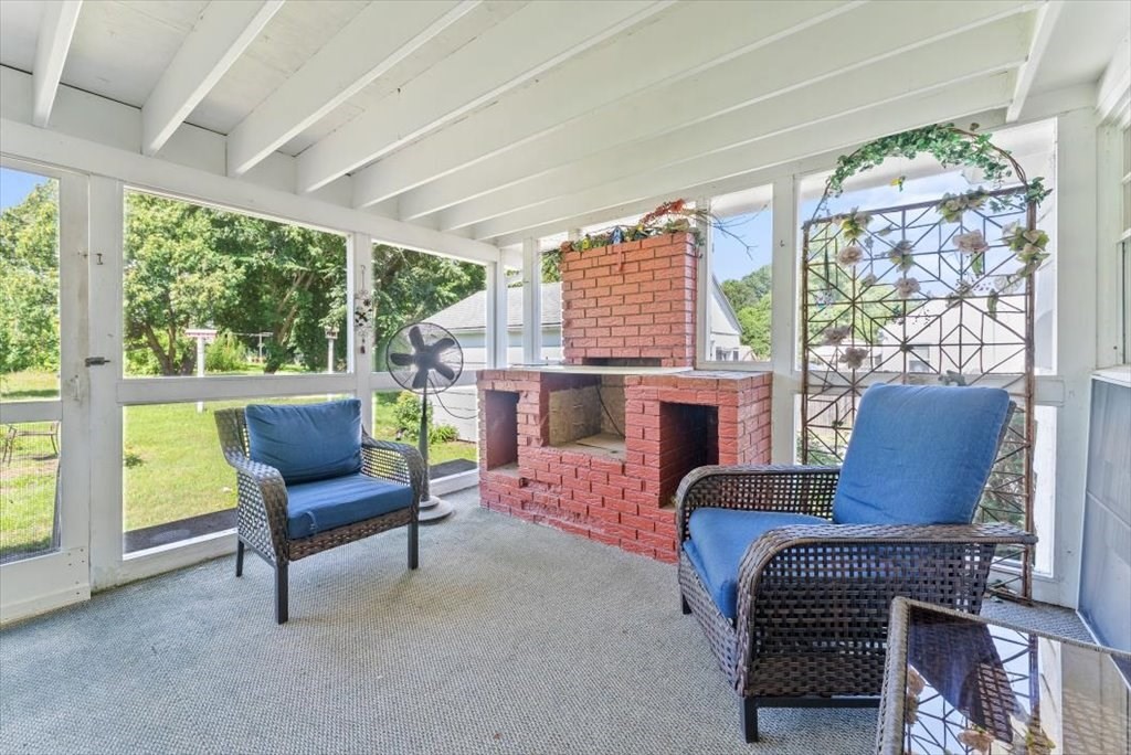528 Morgan Road West Springfield, MA 01089 - Photo 24 of 42 a living room with furniture a fireplace and large windows