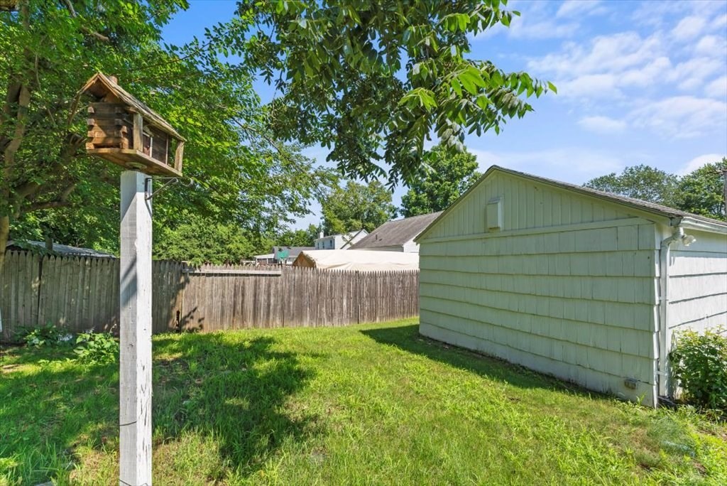 528 Morgan Road West Springfield, MA 01089 - Photo 38 of 42 a backyard of a house with lots of green space
