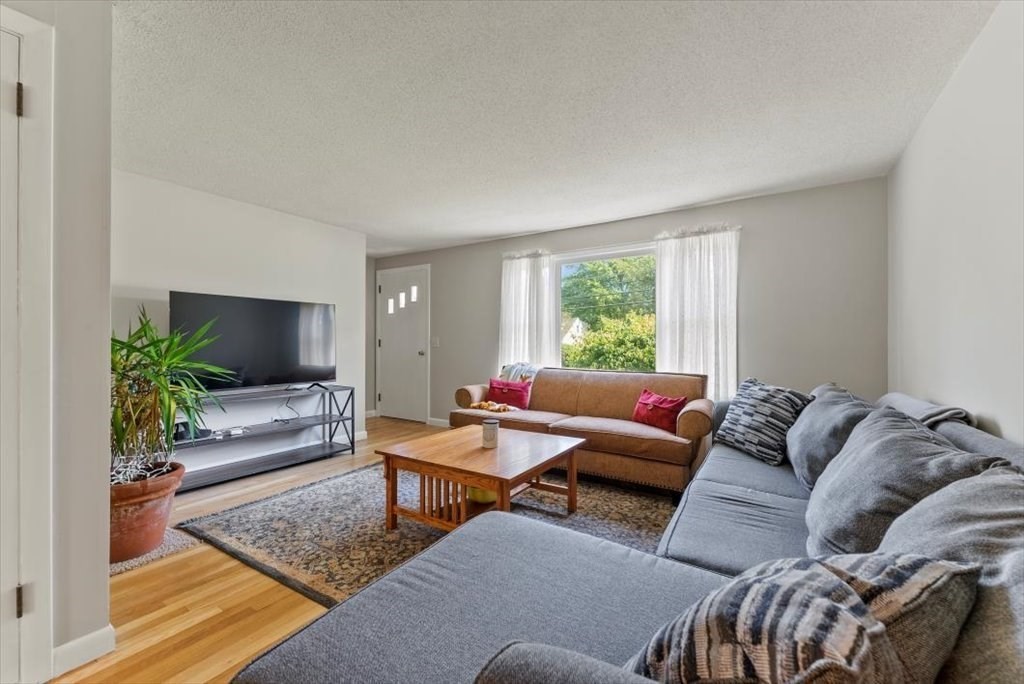 528 Morgan Road West Springfield, MA 01089 - Photo 6 of 42 a living room with furniture and a flat screen tv