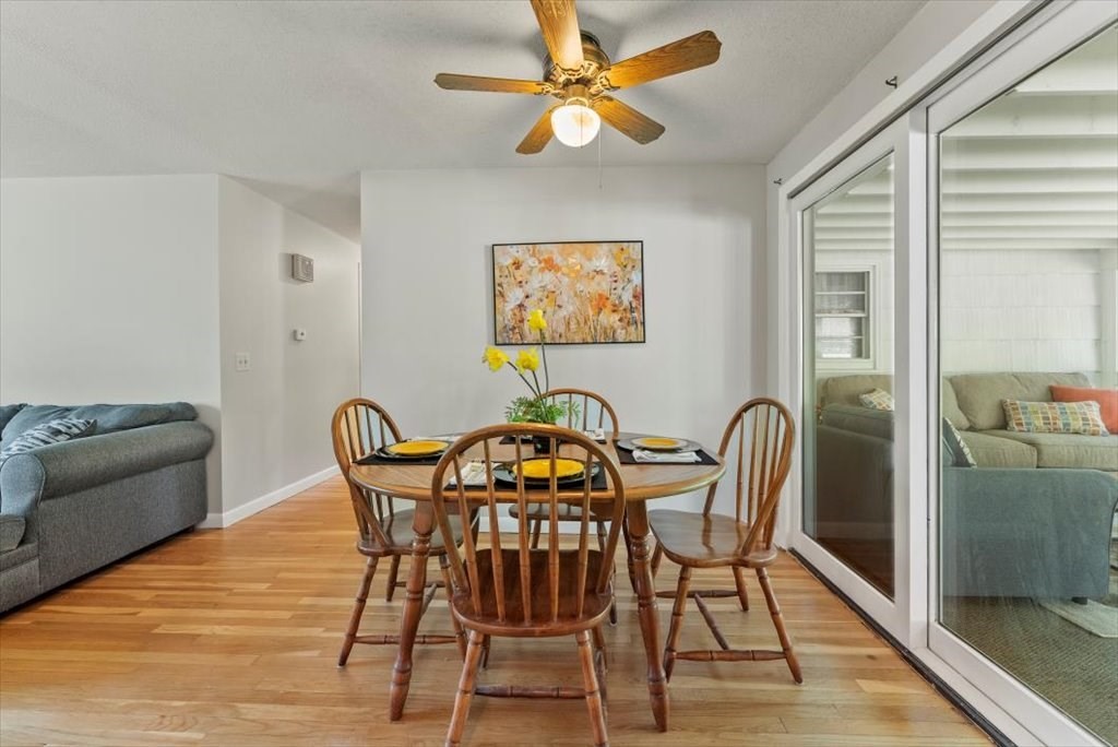 528 Morgan Road West Springfield, MA 01089 - Photo 10 of 42 a view of a dining room with furniture and wooden floor
