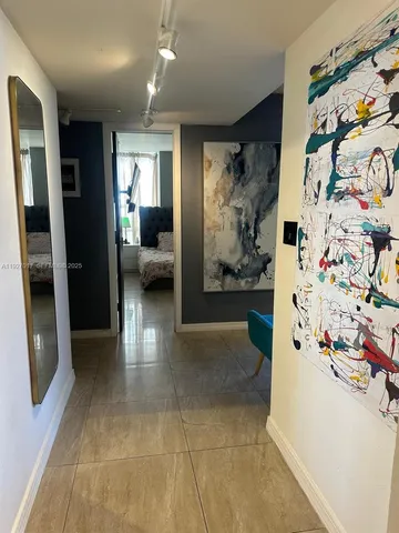 a view of livingroom with furniture and toys