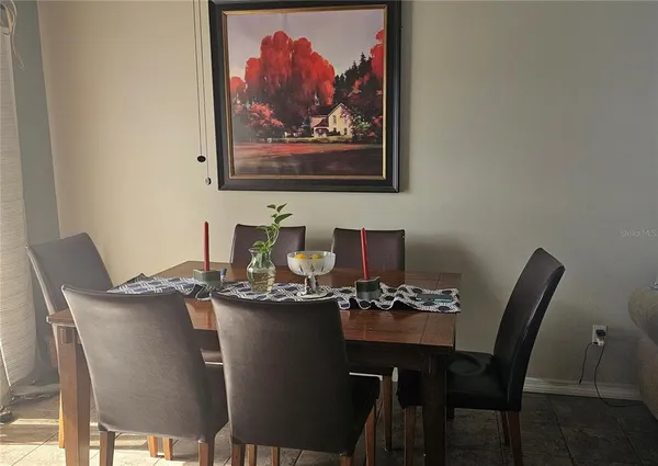 a view of a dining room with furniture