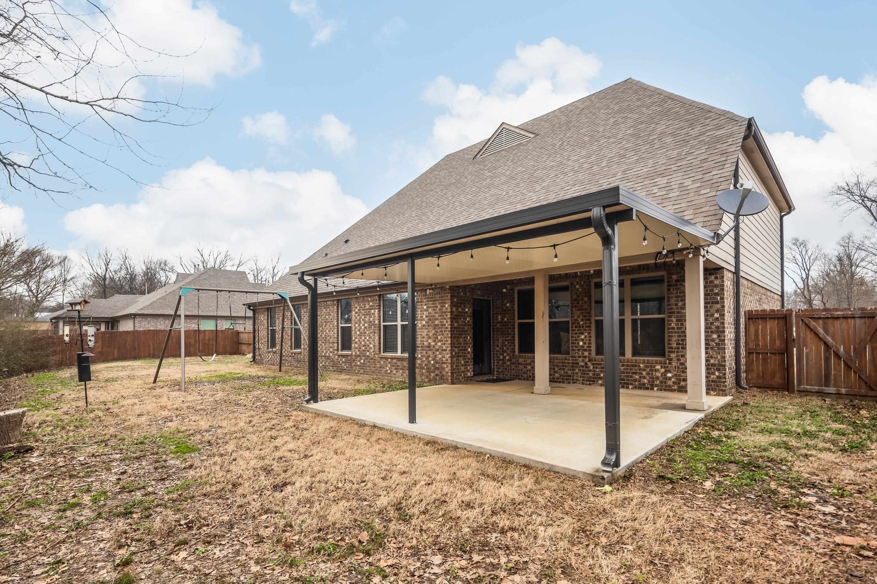7313 Shadow Run Lane Bartlett, TN 38002 - Photo 22 of 40 a backyard of a house