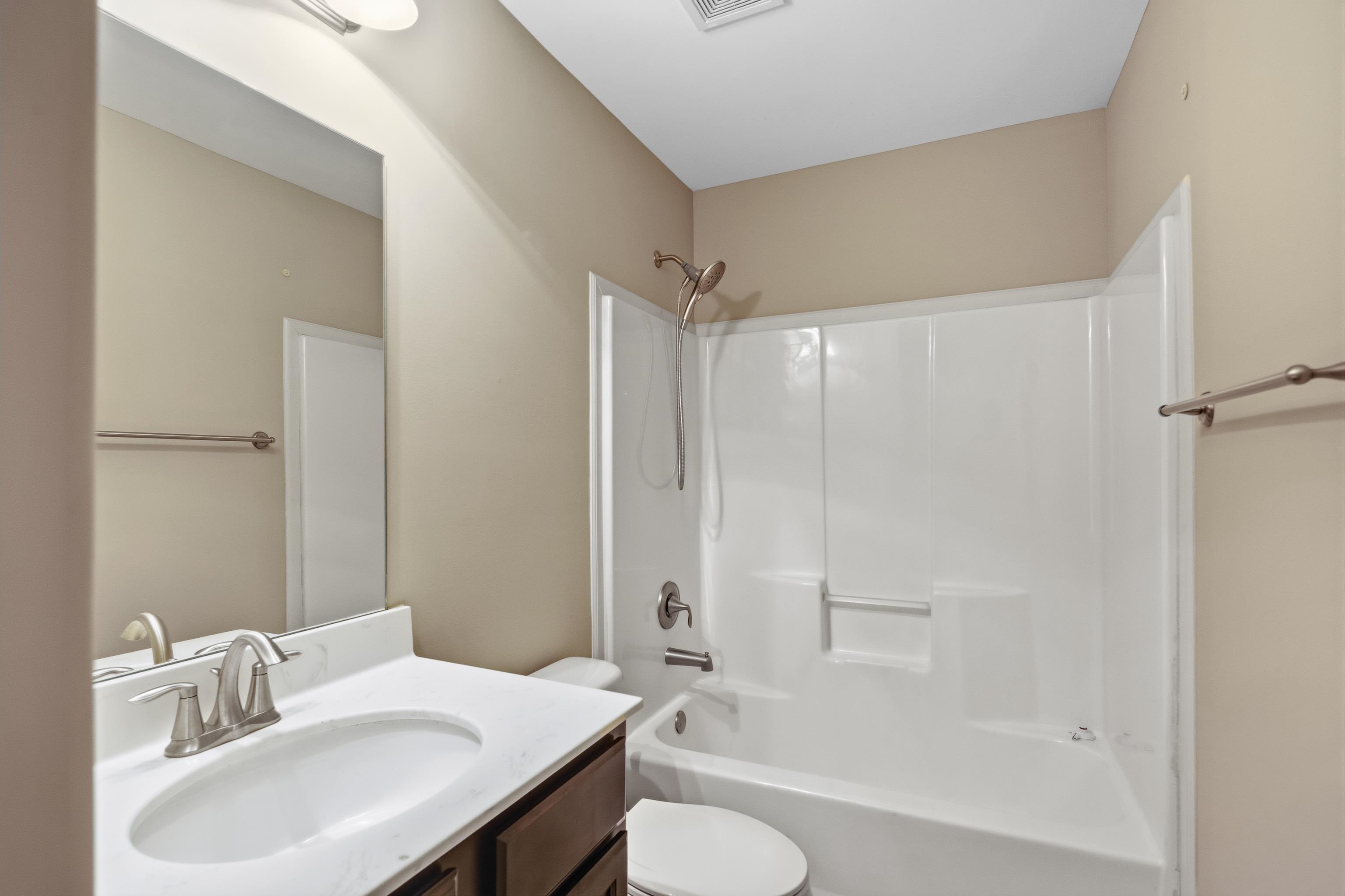 7313 Shadow Run Lane Bartlett, TN 38002 - Photo 37 of 40 a bathroom with a sink toilet and shower