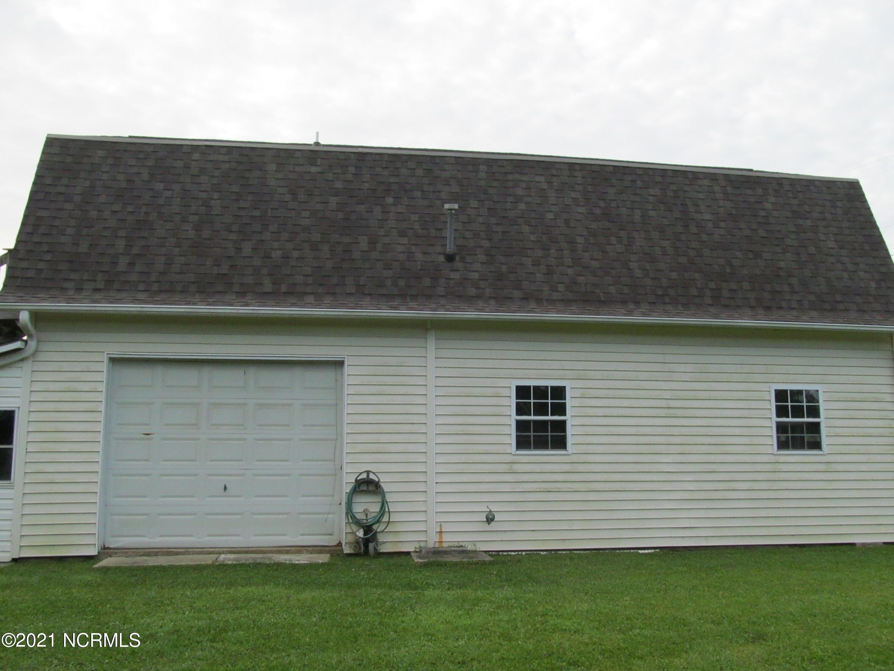 266 Community Road Davis, NC 28524 - Photo 5 of 35 Side View garage