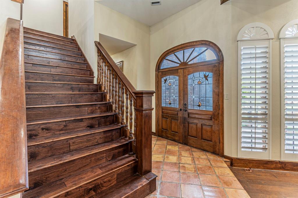 2714 Ridge Top Lane Arlington, TX 76006 - Photo 23 of 37 Entryway featuring stone tile flooring and french doors