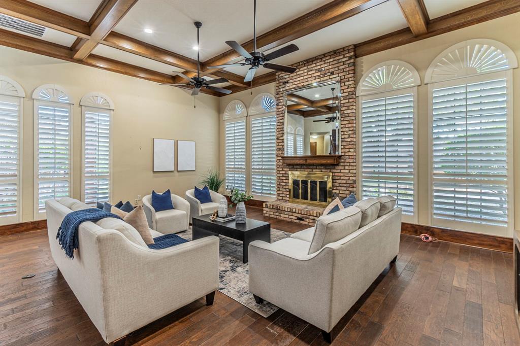 2714 Ridge Top Lane Arlington, TX 76006 - Photo 5 of 37 Living area with coffered ceiling, a fireplace, dark wood-style flooring, ceiling fan, and recessed lighting