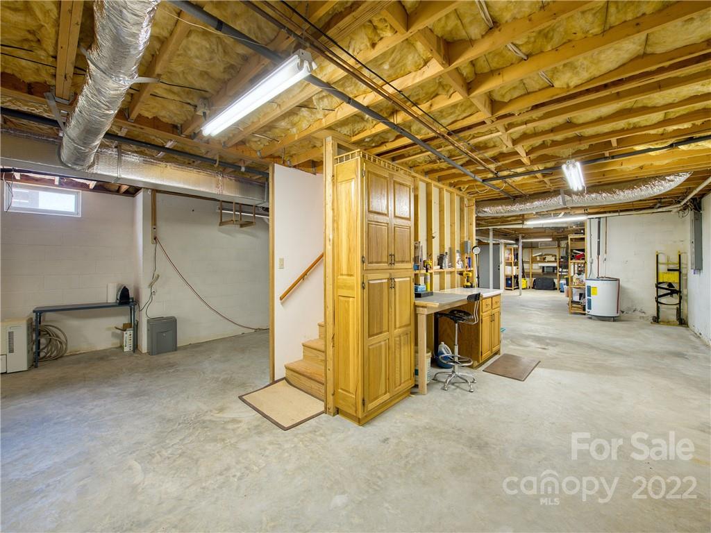 322 Kitchens Branch Road Sylva, NC 28779 - Photo 41 of 48 a view of a room with wooden walls