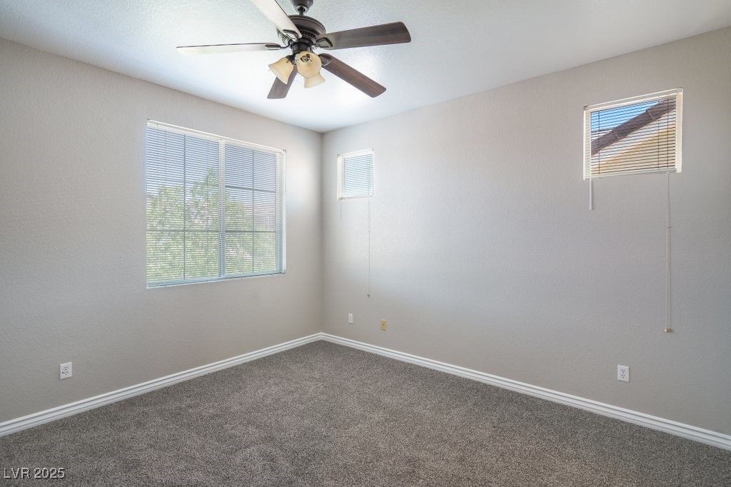 8121 Altamont Ridge Street Las Vegas, NV 89113 - Photo 11 of 27 Carpeted secondary bedroom with new carpet / baseb