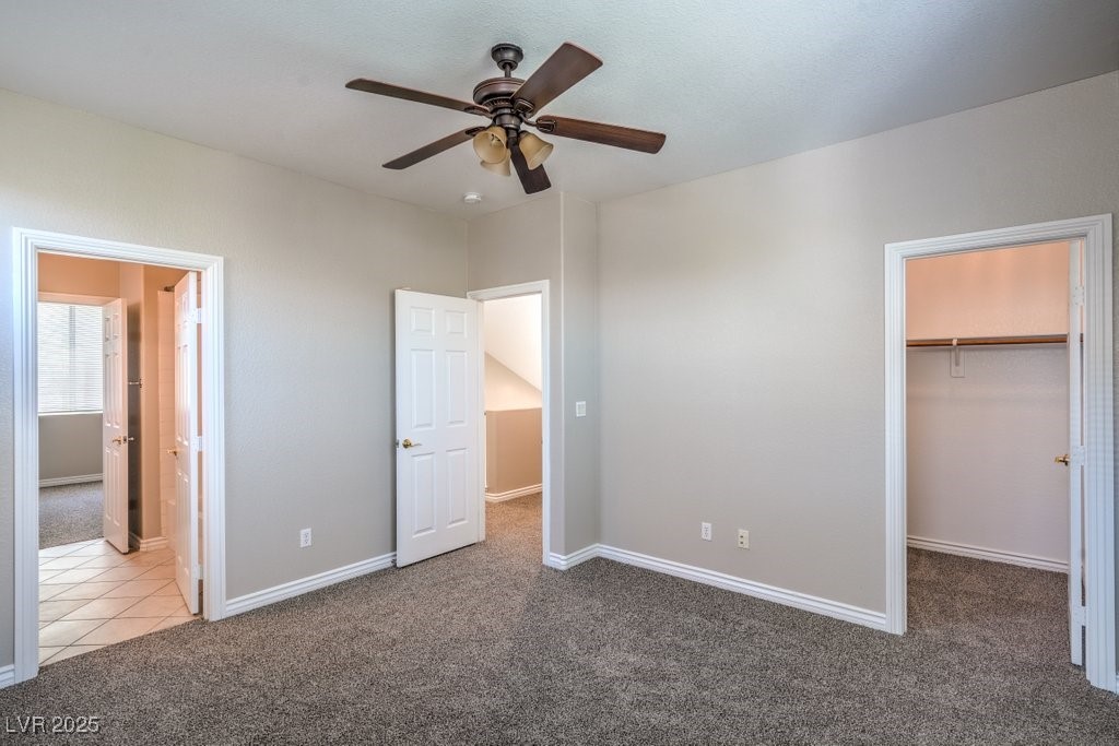 8121 Altamont Ridge Street Las Vegas, NV 89113 - Photo 12 of 27 Unfurnished bedroom upstairs featuring carpet floo