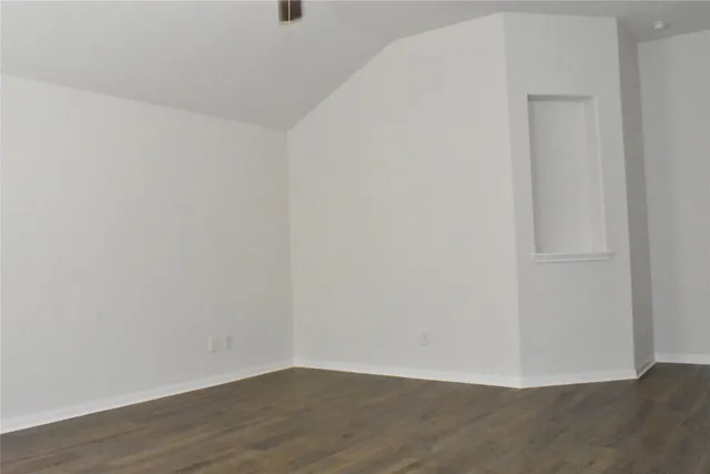 a white bath tub sitting next to a window