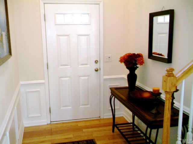 7810 Jeffrey Alan Court Raleigh, NC 27613 - Photo 2 of 11 Beautiful hardwood floor entrance to a 2-story foyer. Other