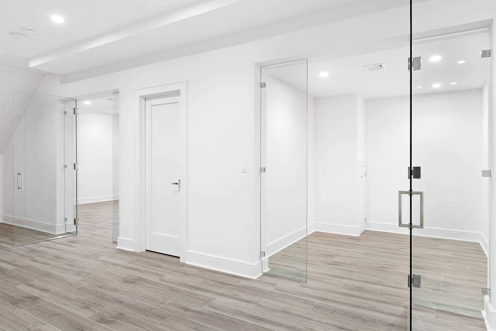 12 Inkberry Street East Hampton, NY 11937 - Photo 18 of 25 a view of a room with wooden floor