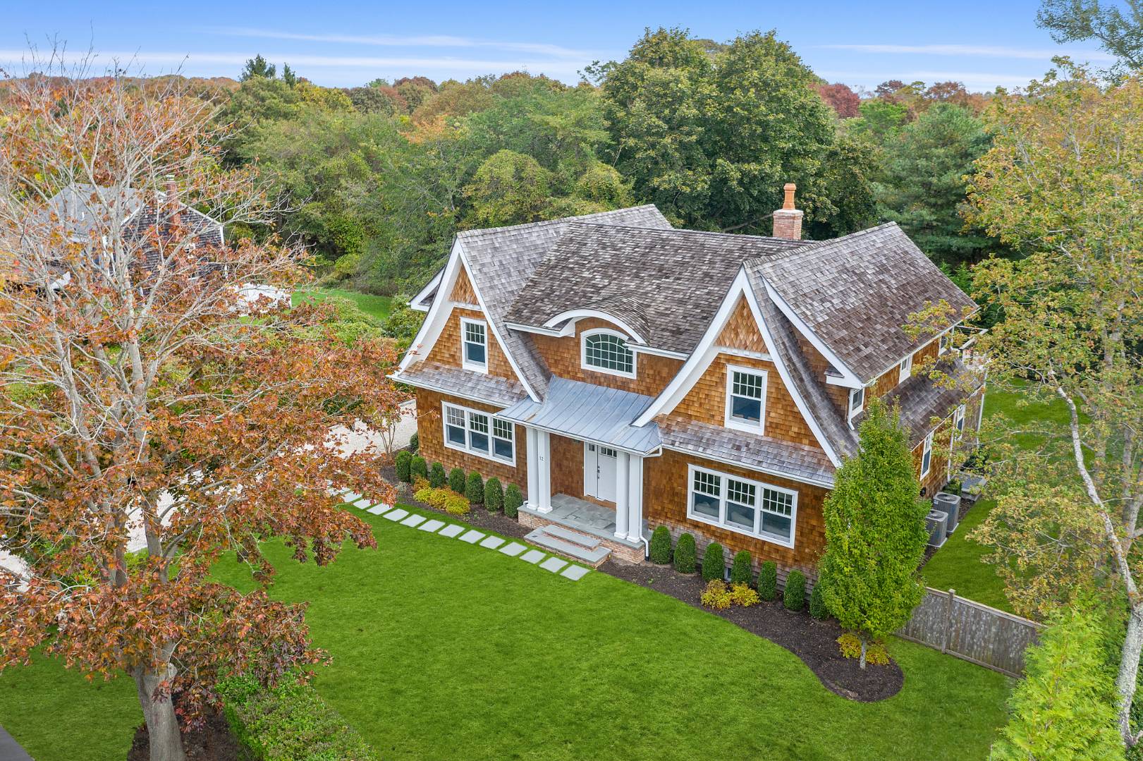 12 Inkberry Street East Hampton, NY 11937 - Photo 19 of 25 front view of house with a yard