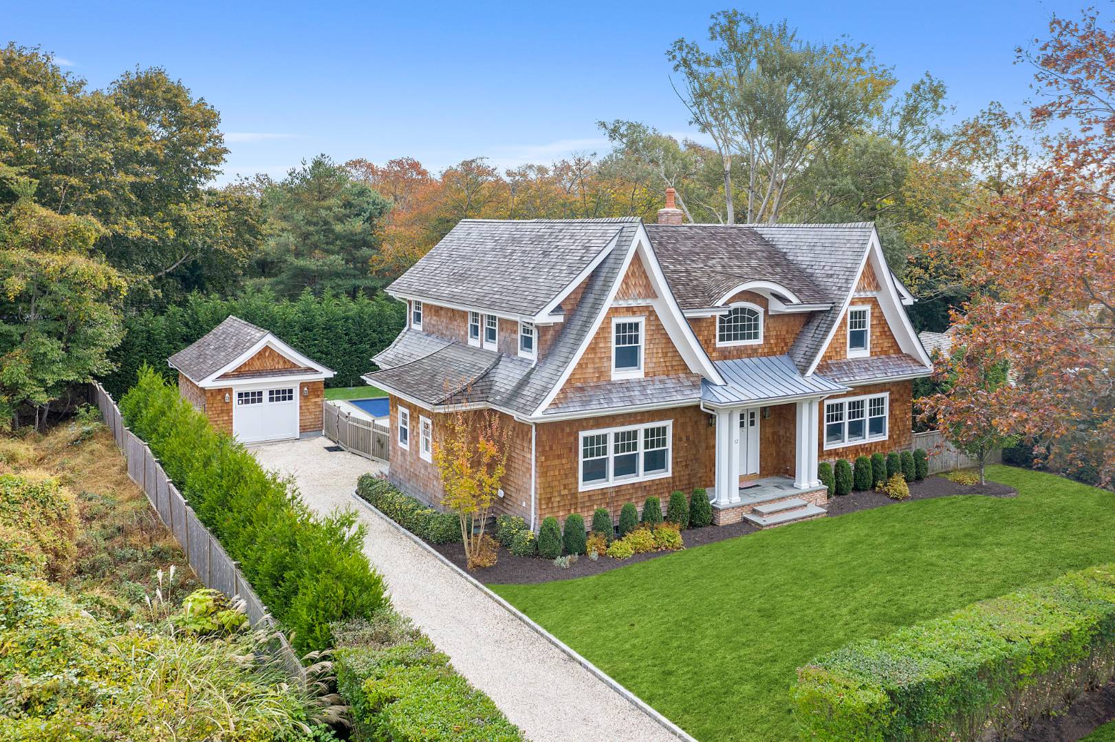 12 Inkberry Street East Hampton, NY 11937 - Photo 20 of 25 a aerial view of a house with a yard