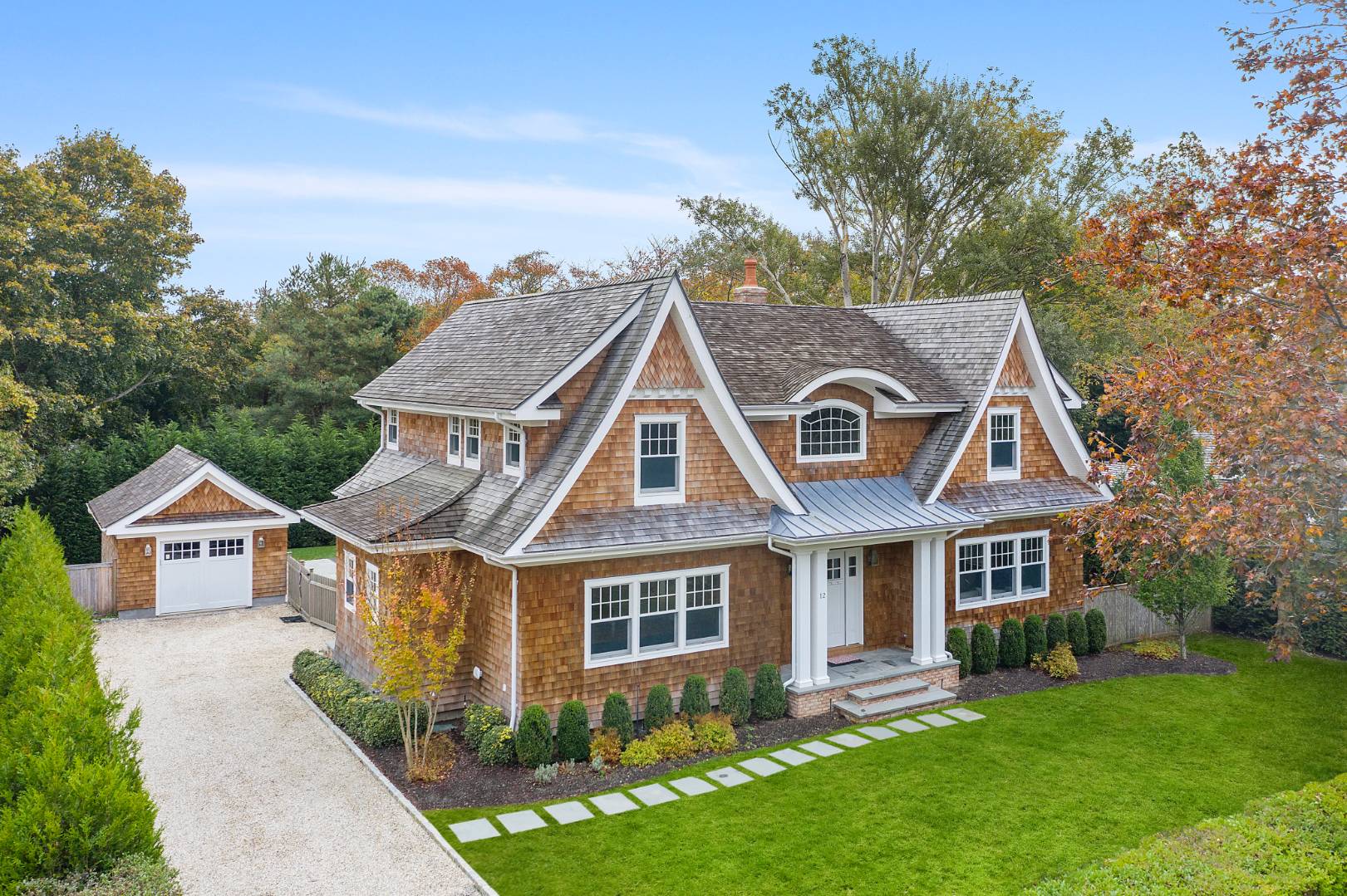 12 Inkberry Street East Hampton, NY 11937 - Photo 21 of 25 front view of house with a yard