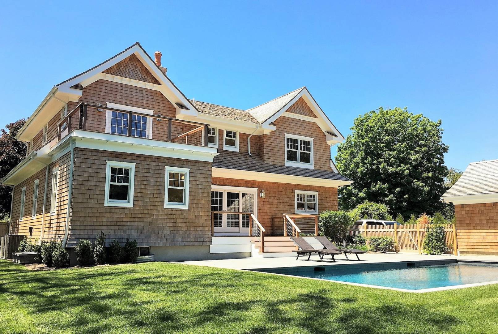 12 Inkberry Street East Hampton, NY 11937 - Photo 24 of 25 a front view of a house with a yard