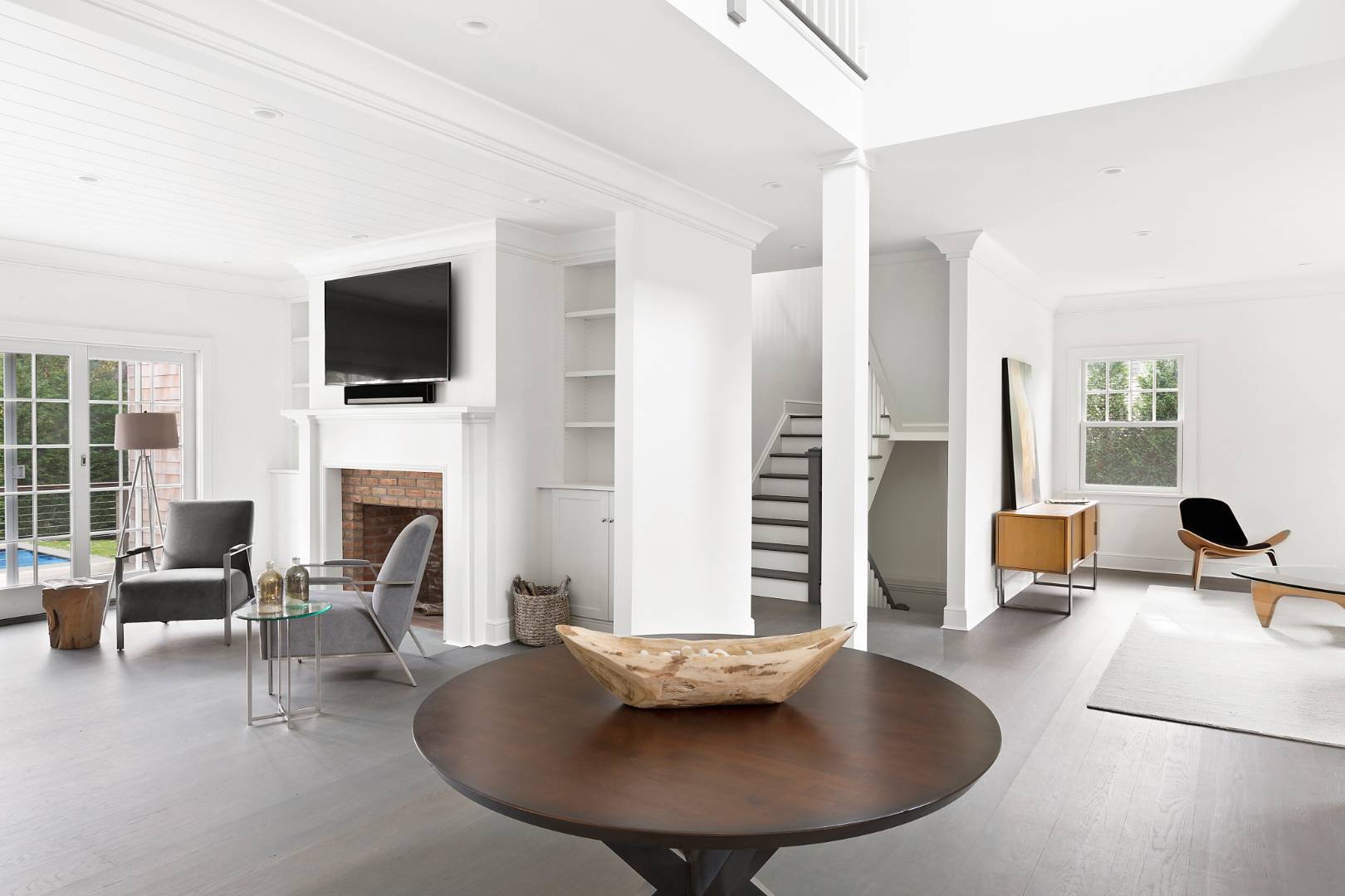12 Inkberry Street East Hampton, NY 11937 - Photo 5 of 25 a living room with fireplace furniture and a flat screen tv