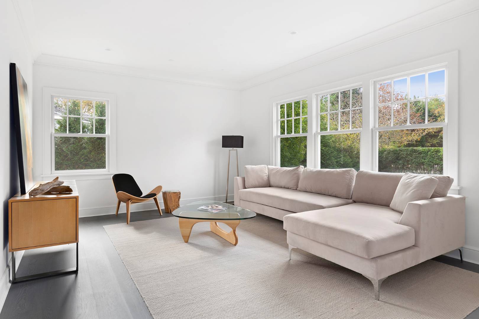 12 Inkberry Street East Hampton, NY 11937 - Photo 6 of 25 a living room with furniture and floor to ceiling windows