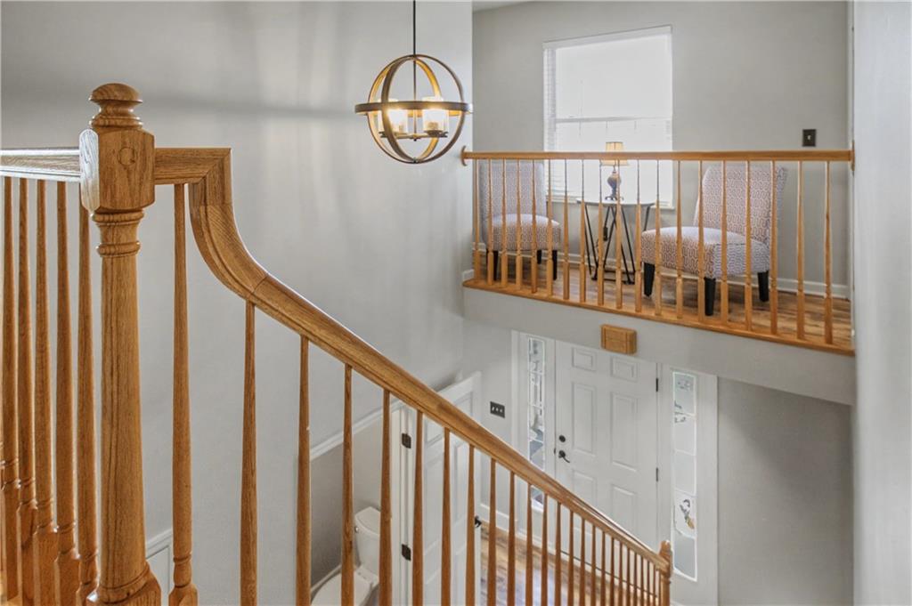 102 Sycamore Lane Washington, PA 15301 - Photo 24 of 33 a view of staircase with railing and a chandelier