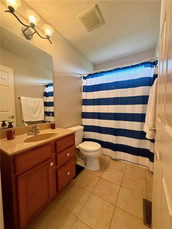 102 Sycamore Lane Washington, PA 15301 - Photo 25 of 33 a bathroom with a sink a toilet and a mirror