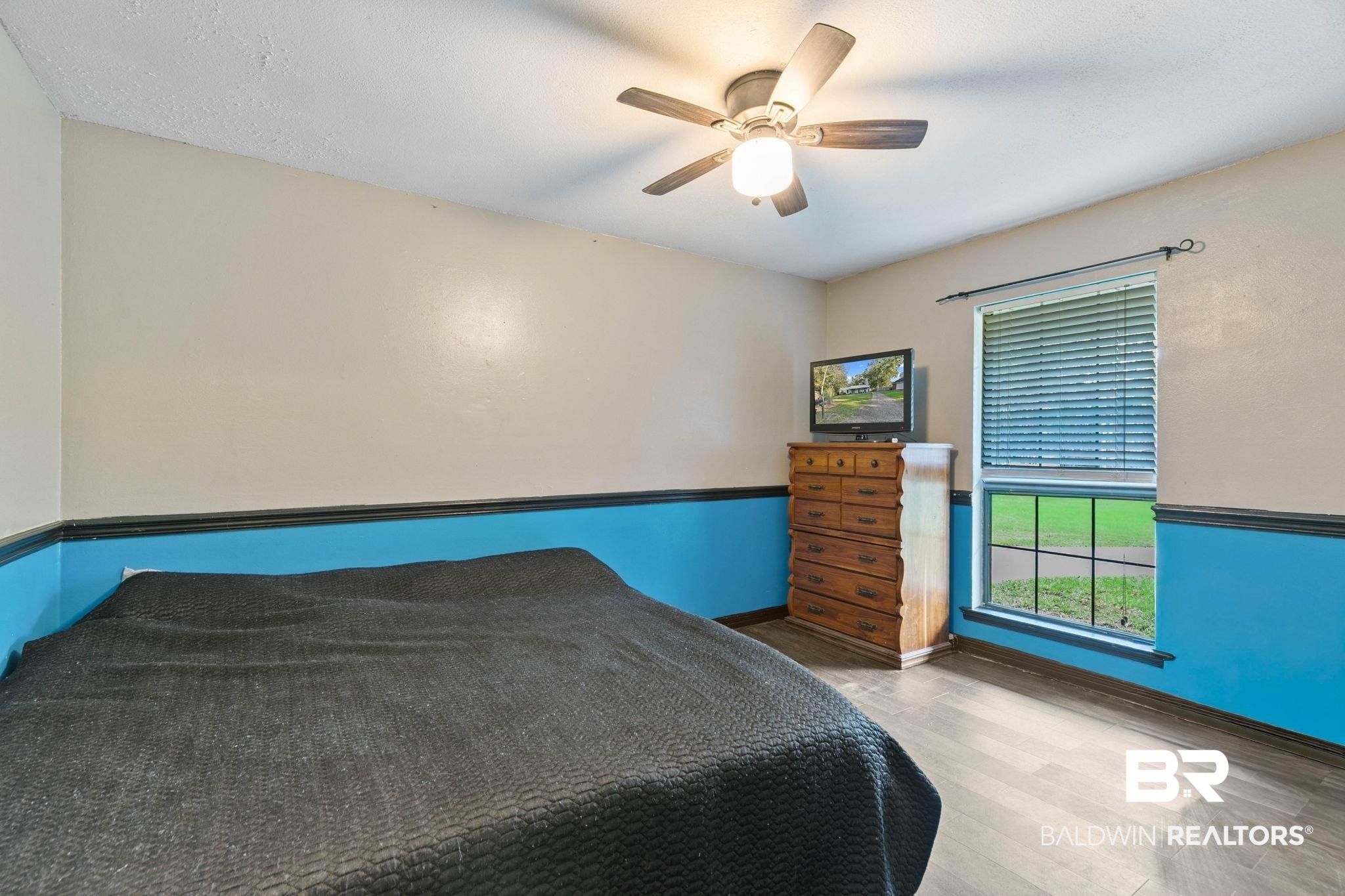 107 Rainer Circle Daphne, AL 36526 - Photo 22 of 31 Bedroom with wood finished floors and ceiling fan