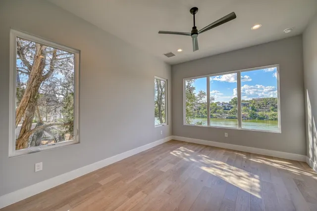 a view of a room that has a large window