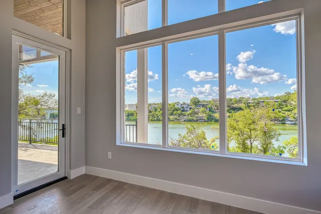 a bathroom with a double vanity sink a mirror and a shower