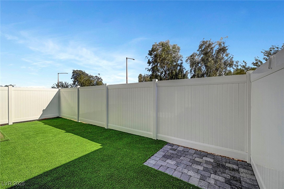 7204 North Decatur Boulevard North Las Vegas, NV 89084 - Photo 54 of 55 View of yard with a fenced backyard