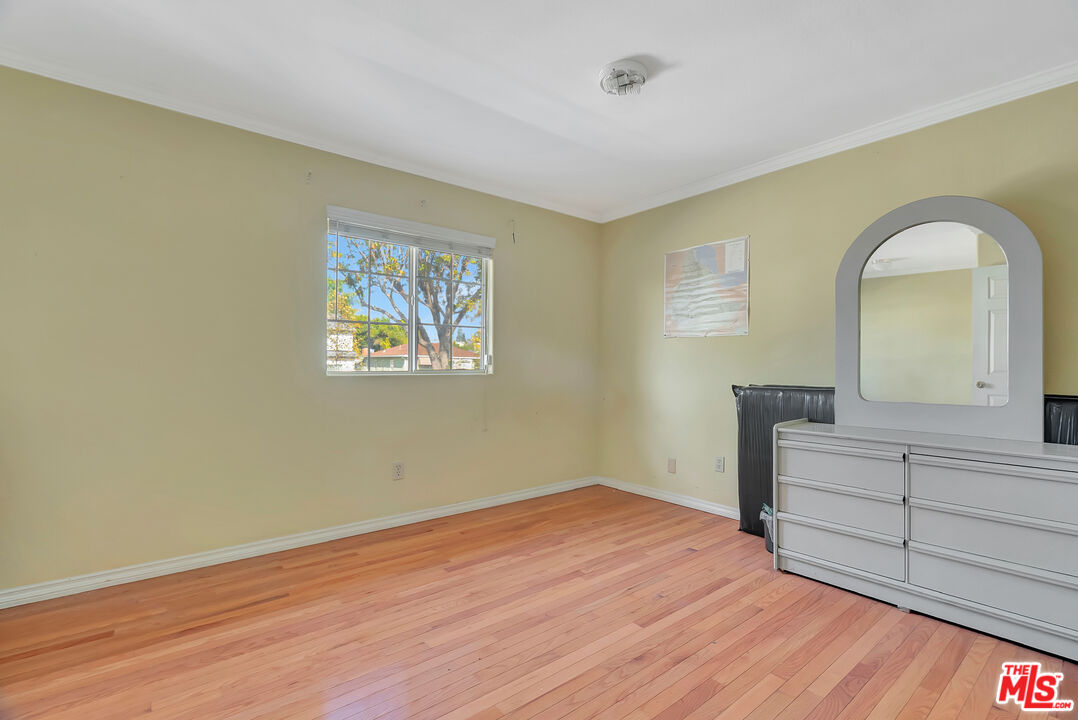 448 West 64th Street Inglewood, CA 90302 - Photo 24 of 39 a view of empty room with wooden floor