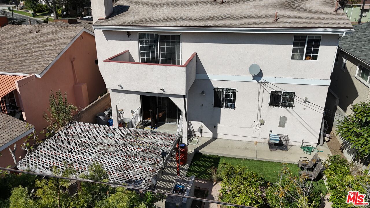 448 West 64th Street Inglewood, CA 90302 - Photo 33 of 39 a view of house with backyard and sitting area