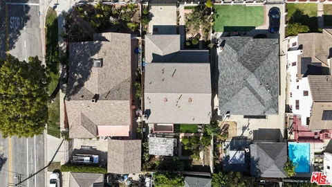an aerial view of residential house with outdoor space