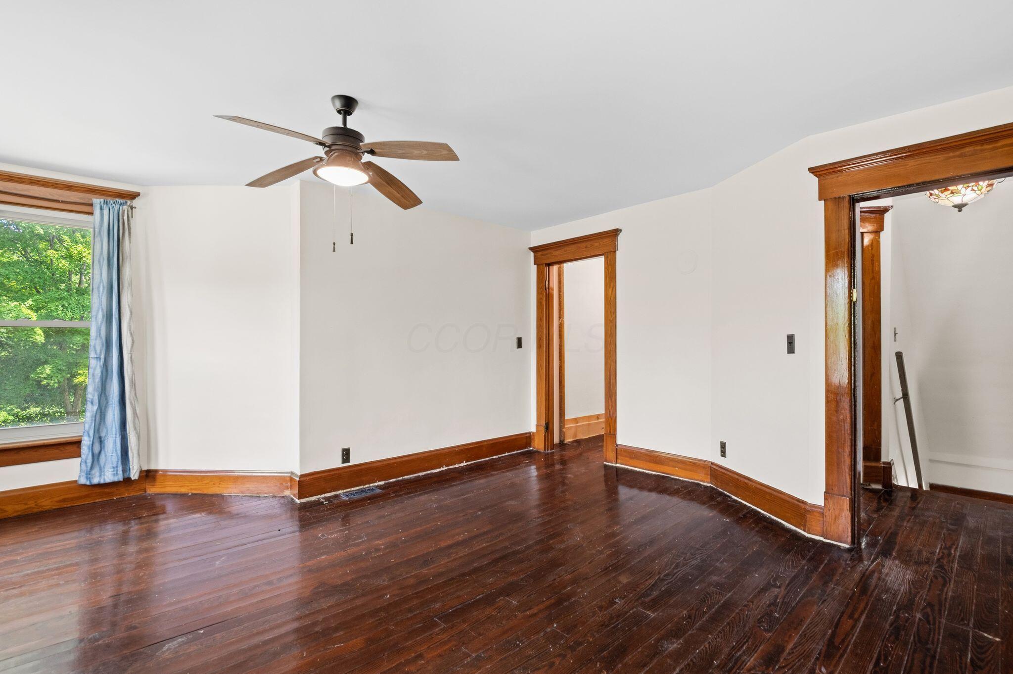 107 Price Road Columbus, OH 43230 - Photo 23 of 51 Rich wood-finish flooring complemented by substantial wood trim and door frames