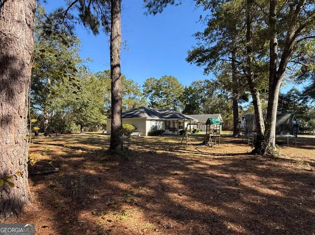 a view of road with trees