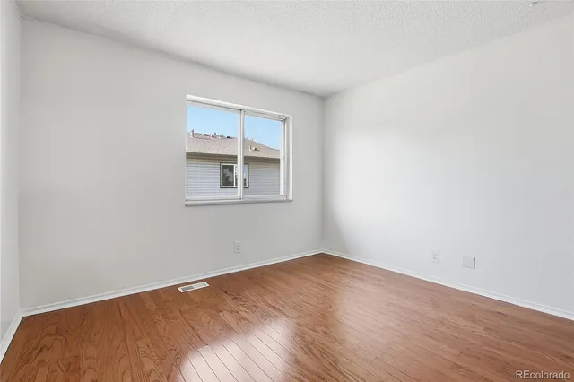 a view of a room that has a window in it