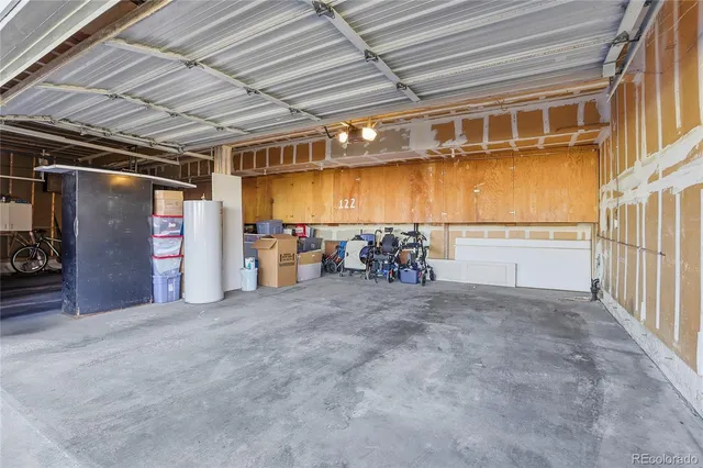 a view of a garage with storage