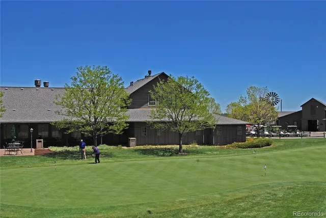 a front view of house with yard and seating