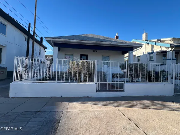 a view of a porch with a small yard