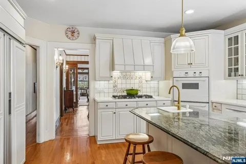 a spacious bedroom with a bed and a couch