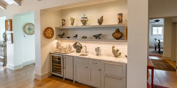 a kitchen with a cabinets and wooden floor