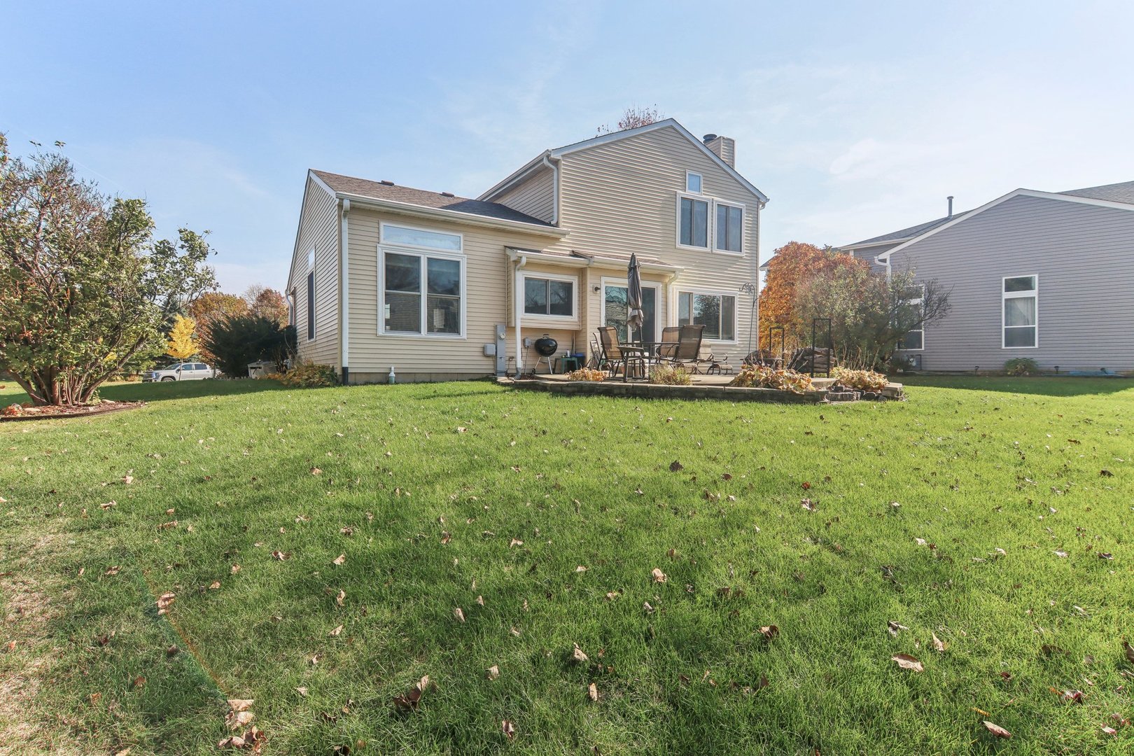 1907 Apple Valley Road Bolingbrook, IL 60490 - Photo 2 of 4 a front view of a house with a yard