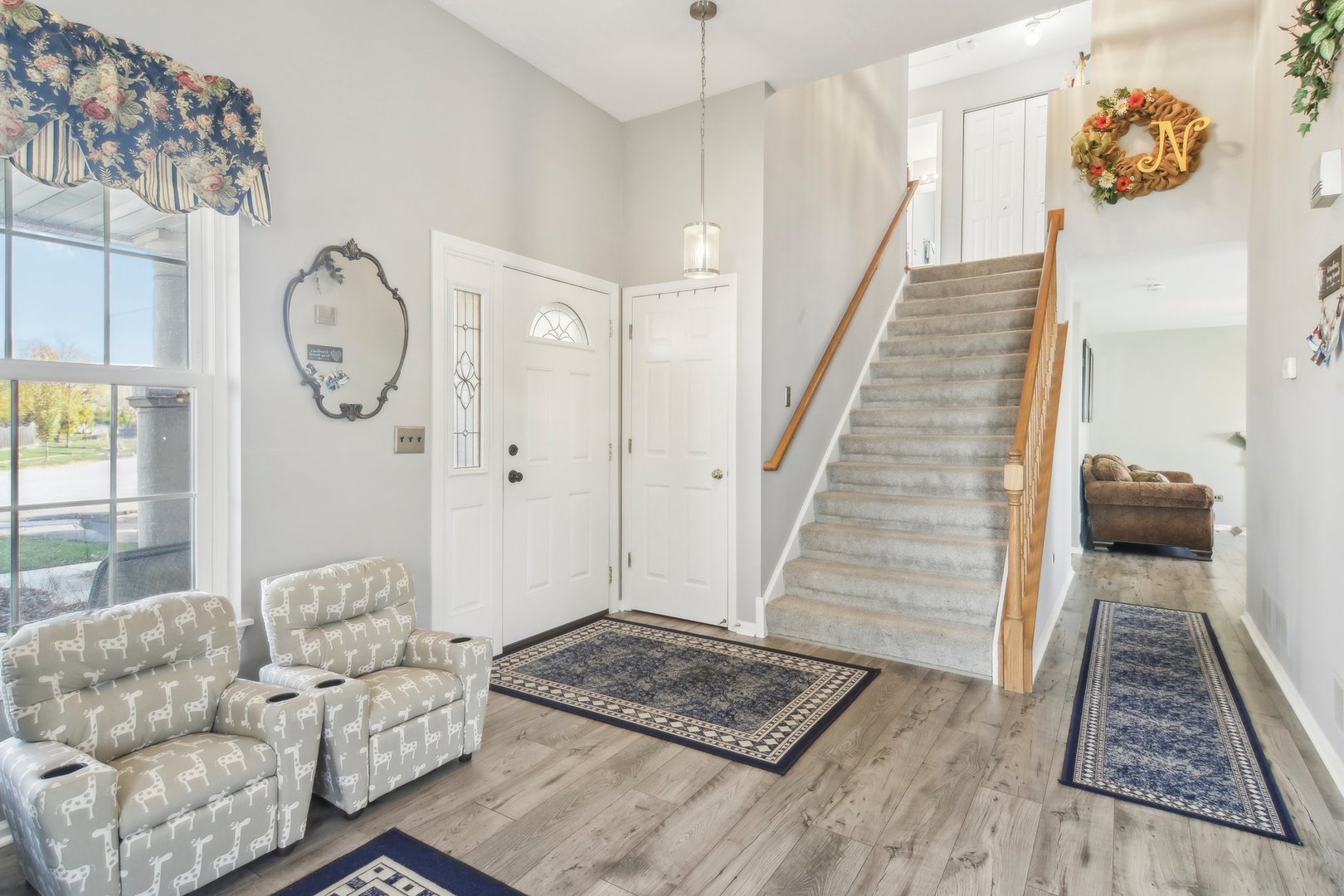 1907 Apple Valley Road Bolingbrook, IL 60490 - Photo 6 of 17 a living room with furniture and a rug