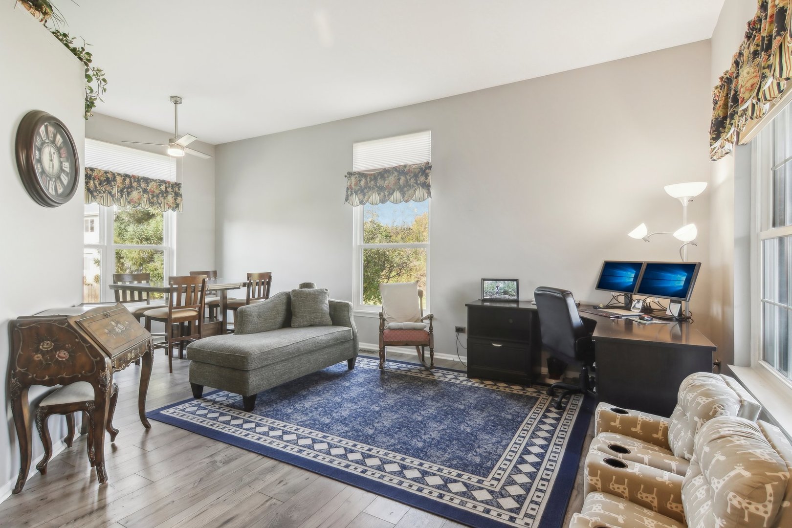 1907 Apple Valley Road Bolingbrook, IL 60490 - Photo 7 of 17 a living room with furniture a rug a window and a fireplace